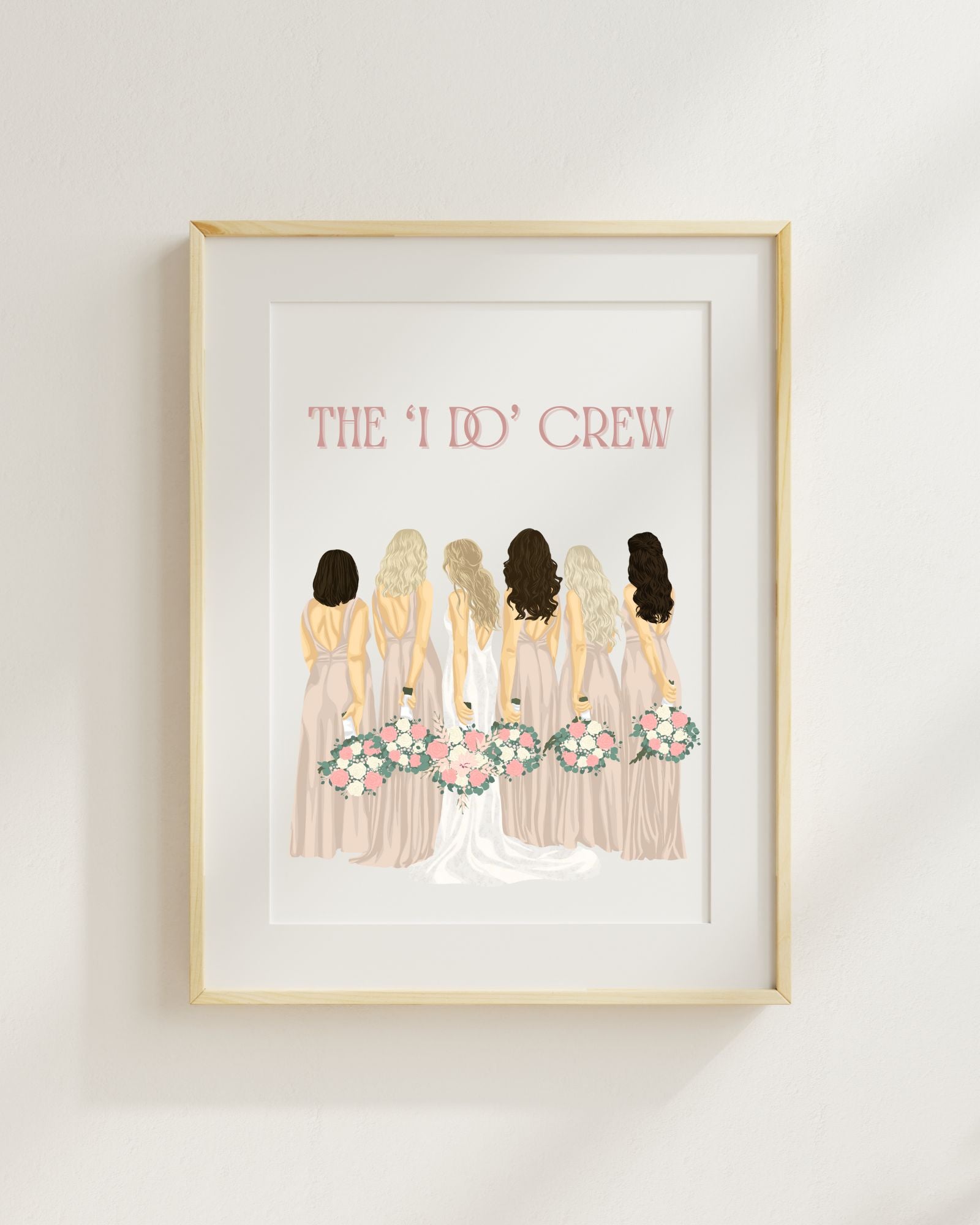 Framed artwork titled 'The I Do Crew' featuring illustrations of the bride with bridesmaids, Maid if Honor, with floral bouquets.